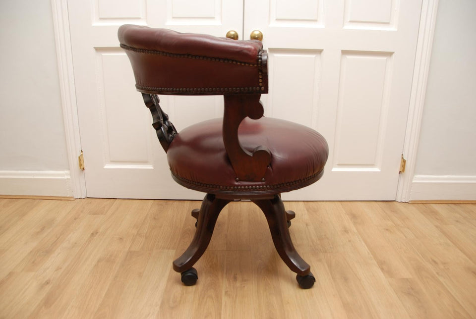 Antique Captains Armchairs Burgundy Leather Upholstery on Castors