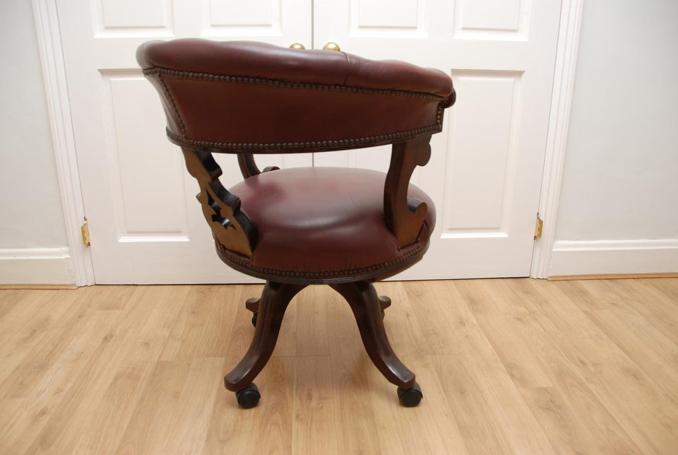 Antique Captains Armchairs Burgundy Leather Upholstery on Castors