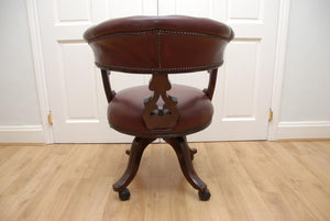 Antique Captains Armchairs Burgundy Leather Upholstery on Castors