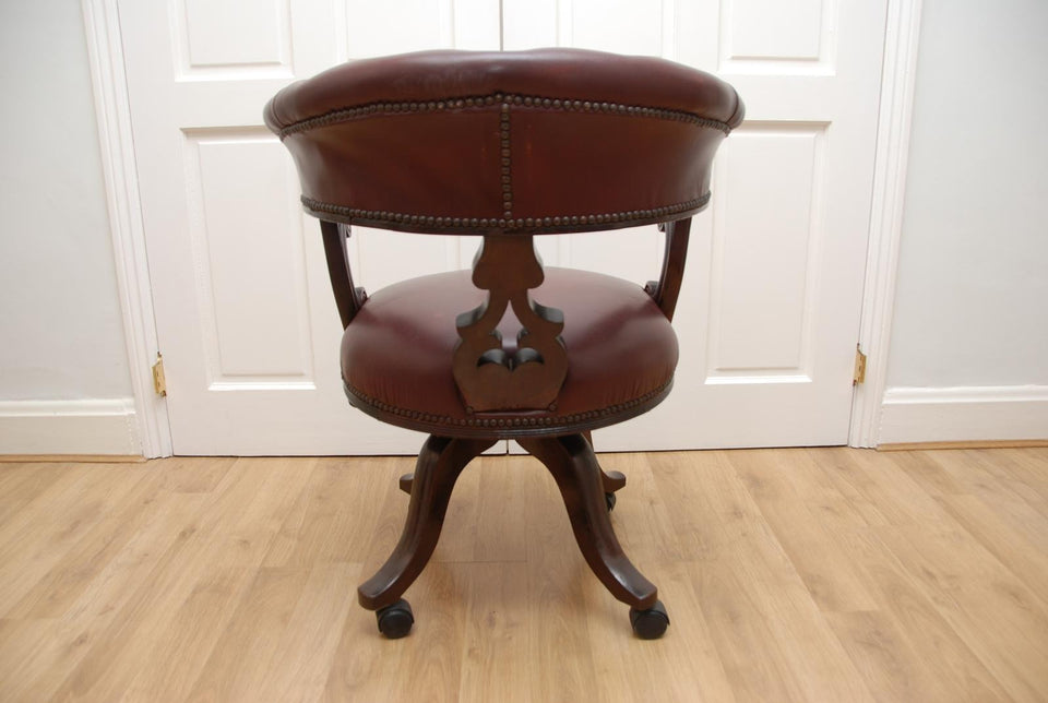 Antique Captains Armchairs Burgundy Leather Upholstery on Castors