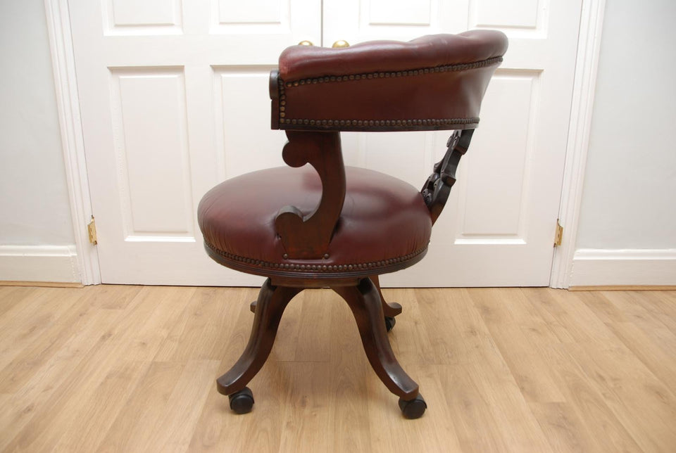 Antique Captains Armchairs Burgundy Leather Upholstery on Castors