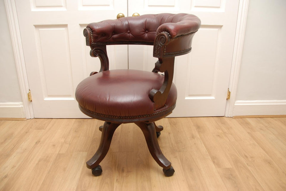 Antique Captains Armchairs Burgundy Leather Upholstery on Castors