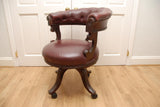 Antique Captains Armchairs Burgundy Leather Upholstery on Castors